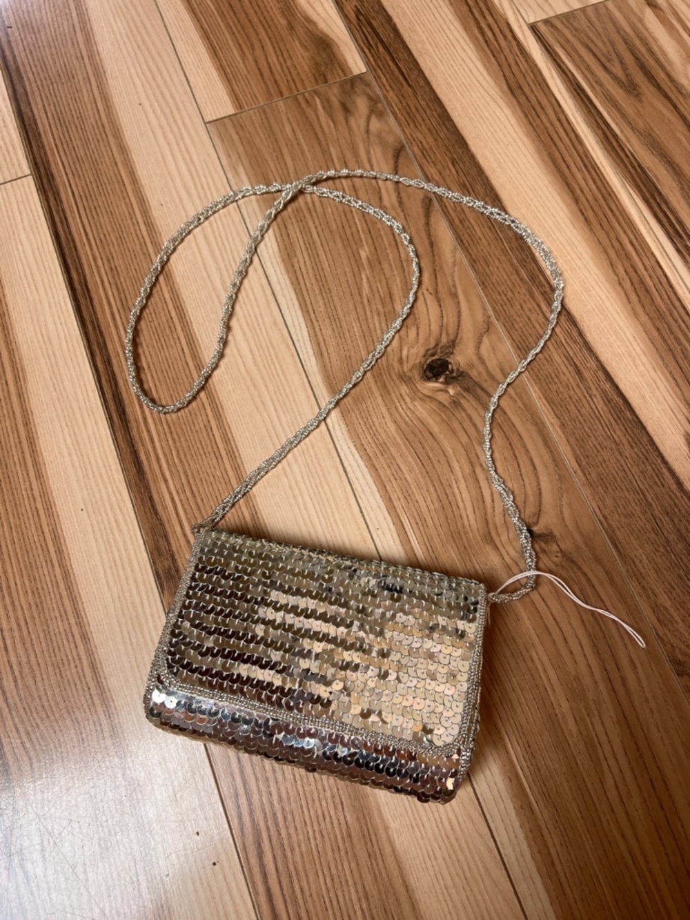 La Regale silver sequin cross body bag